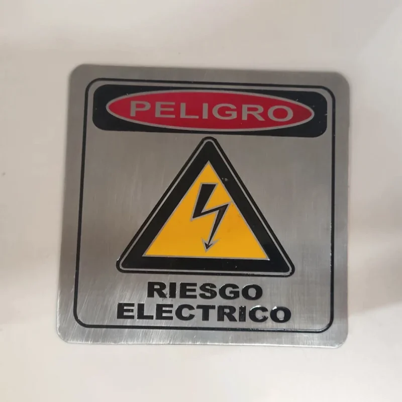 Placa Peligro Riesgo Eléctrico en Acero Inoxidable 10 cm Placa peligro riesgo eléctrico